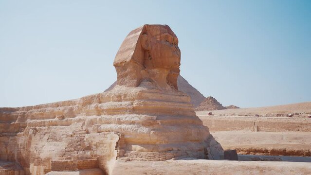 View of the pyramids of Giza in Egypt. Ancient sphinx and pyramids, symbol of Egypt. Beautiful pyramids of Egypt in Africa. A historic site right next door to Cairo and Giza in Africa.