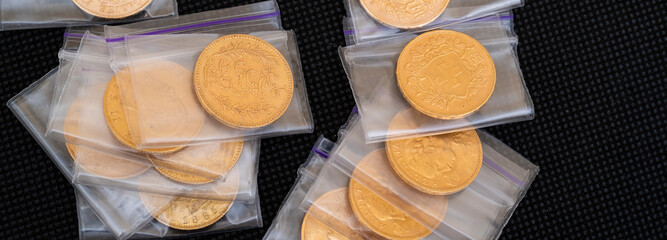 Austrian four ducats on US dollars. Investments in investment coins. The concept of buying gold. investment in gold.