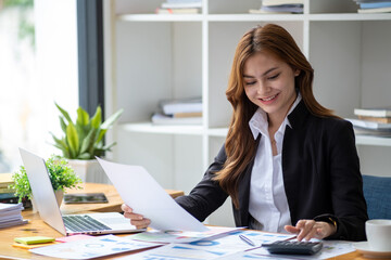 Successful happy smiling businesswoman saleswoman working on laptop computer, Young female making on video conference meeting online zoom, Accounting woman do taxes calculation interest rates law firm