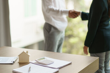 Approved stamp with Business people signing contract making deal with real estate consultant home insurance.Real estate investment Property insurance security offer house.