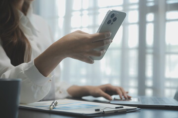 Audit concept,Administrator business man financial inspector and secretary making report calculating balance. Internal Revenue Service checking document.