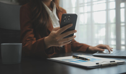 Audit concept,Administrator business man financial inspector and secretary making report calculating balance. Internal Revenue Service checking document.