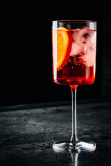 alcohol cocktail in a glass stands on a table in a bar or restaurant
