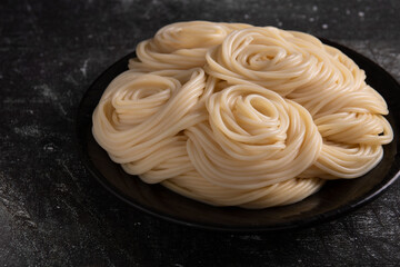 photo of pasta lying in a plate