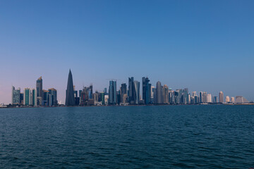 Doha, Qatar - January 26 2023: A view of the sea and the towers in Doha, one of the most beautiful tourist places in Qatar 