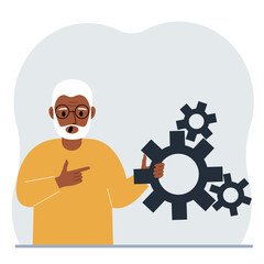 A man holds gears in his hand. Points a finger at the cogwheels. The concept of financial planning, movement, life, education or maintenance.