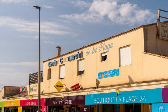 slightly decayed shopping center in Valras France on the beach 