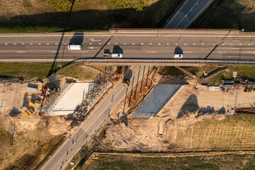 Drone photography of highway bridge being built during spring day