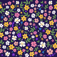 Trendy seamless botanical textile print.Small multi-colored flowers on a dark background seamless pattern for fabric, paper. Vector, hand drawn, Floral fashion pattern, ditsy print