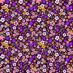 Trendy seamless botanical textile print.Small multi-colored flowers on a dark background seamless pattern for fabric, paper. Vector, hand drawn, Floral fashion pattern, ditsy print