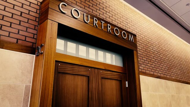 courtroom door and seating benches dark color grade slow motion