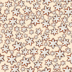 Gingerbread snowflakes.Seamless pattern with gingerbread cookies in the form of snowflakes, on a pastel background