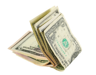 Folded one dollars isolated on white