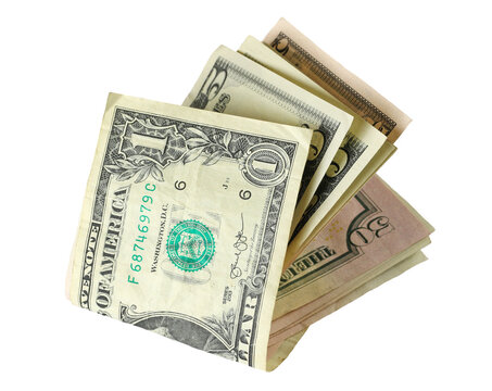Folded one dollars isolated on white