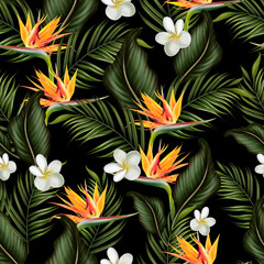 Tropical  seamless pattern with green leaves and flowers.