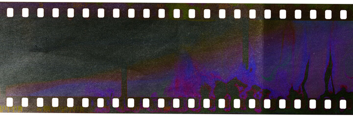 Start of 35mm negative filmstrip, real scan of film material with cool scanning light interferences...