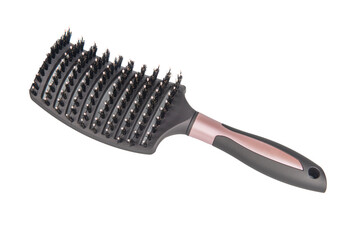 A bristled pink hair brush against a white background