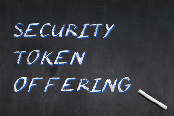 Security Token Offering written on a blackboard