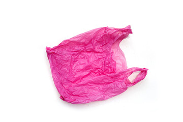 Pink plastic bag on white background. Copy space
