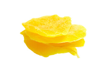 Naklejka premium Dried mango slices isolated on white background. Stack of dehydrated fruit chips. Candied mango