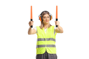 Female aircraft marshaller with wands