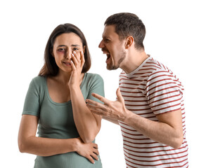 Angry young man shouting at his crying wife on white background. Domestic violence concept