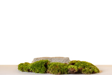 Natural style. Stone podium with green moss on a transparent background. Still life for the...