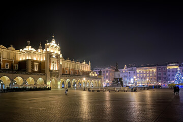 Fototapeta na wymiar Krakow, Poland main market square with Cloth Hall at night in winter.