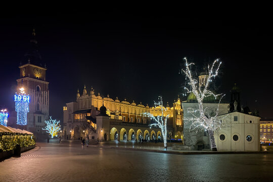 Krakow, Poland main market square at night in winter.