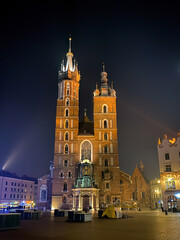 Fototapeta na wymiar Basilica of Saint Mary in Krakow, Poland at night in winter.