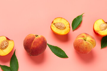 Sweet peaches and leaves on pink background