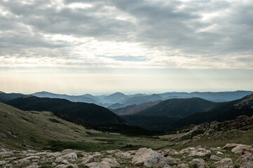 Fototapeta na wymiar Haze Fills The Spaces Between The Peaks of Rocky Mountain