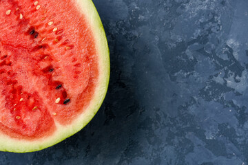 Fototapeta na wymiar Half of fresh watermelon on blue background