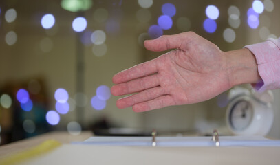 businessman gives hand for handshake proposes partnership in concept of agreement and dealing successful, start up cooperation, relaxing greeting in office