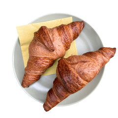 Two croissants on a plate isolated png file