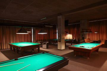 Empty green billiard tables in club. Pool Game