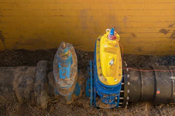 Underground distribution of gas tap, fixing service, buried underground on the street.