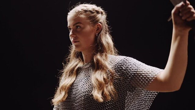 Lady Warrior Riding Horse In Studio