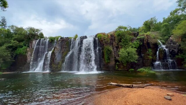 South Africa most scenic waterfalls Forest Falls Sabie Nelsprit Mombela Johannesburg Kruger National Park Graskop Lisbon cinematic spring lush peaceful calm still water
slow motion left pan from sand