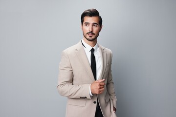 man handsome copyspace portrait stylish happy smiling suit businessman business beige