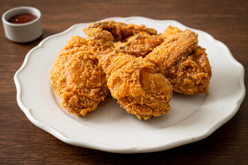 fried chicken with ketchup on plate