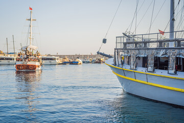 Fototapeta premium Old town Kaleici in Antalya. Panoramic view of Antalya Old Town port, Taurus mountains and Mediterrranean Sea, Turkey