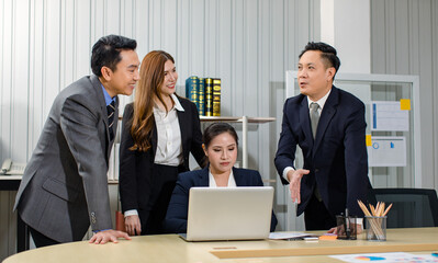 Asian professional successful male female businessmen businesswomen in formal business suit sitting standing talking in video call meeting online in laptop notebook computer