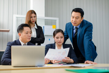 Asian professional successful male female businessmen businesswomen in formal business suit sitting standing talking in video call meeting online in laptop notebook computer