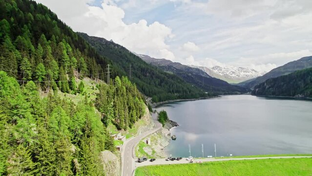 Lai da Marmorera, a reservoir in the Grisons, Switzerland, part of the Parc Ela nature park, drone flight.