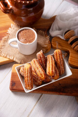 Churros. Fried wheat flour dough, a very popular sweet snack in Spain, Mexico and other countries where it is customary to eat them for breakfast or snack accompanied by hot chocolate or coffee.