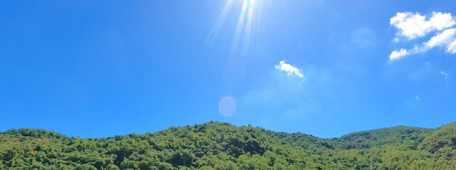 Obraz premium Blue sky, water, sunshine, clouds, lake, sup