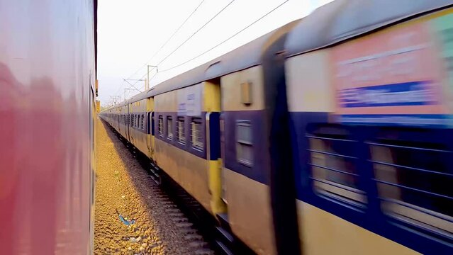 passenger train running on track crossing each other from opposite direction at morning video is taken at new delhi railway station on Aug 04 2022.