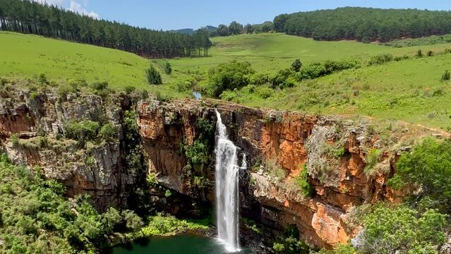 Sabie Lisbon Falls stunning Waterfall South Africa incredible lush green grass spring summer beautiful daytime scenic landscape peaceful view adventure Johannesburg gem slow motion pan left