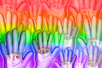 Hands with rainbow colors. LGBTQ symbol of Love, Freedom, Peace, Lesbian. A month of the gay pride community does not care about the pandemic.